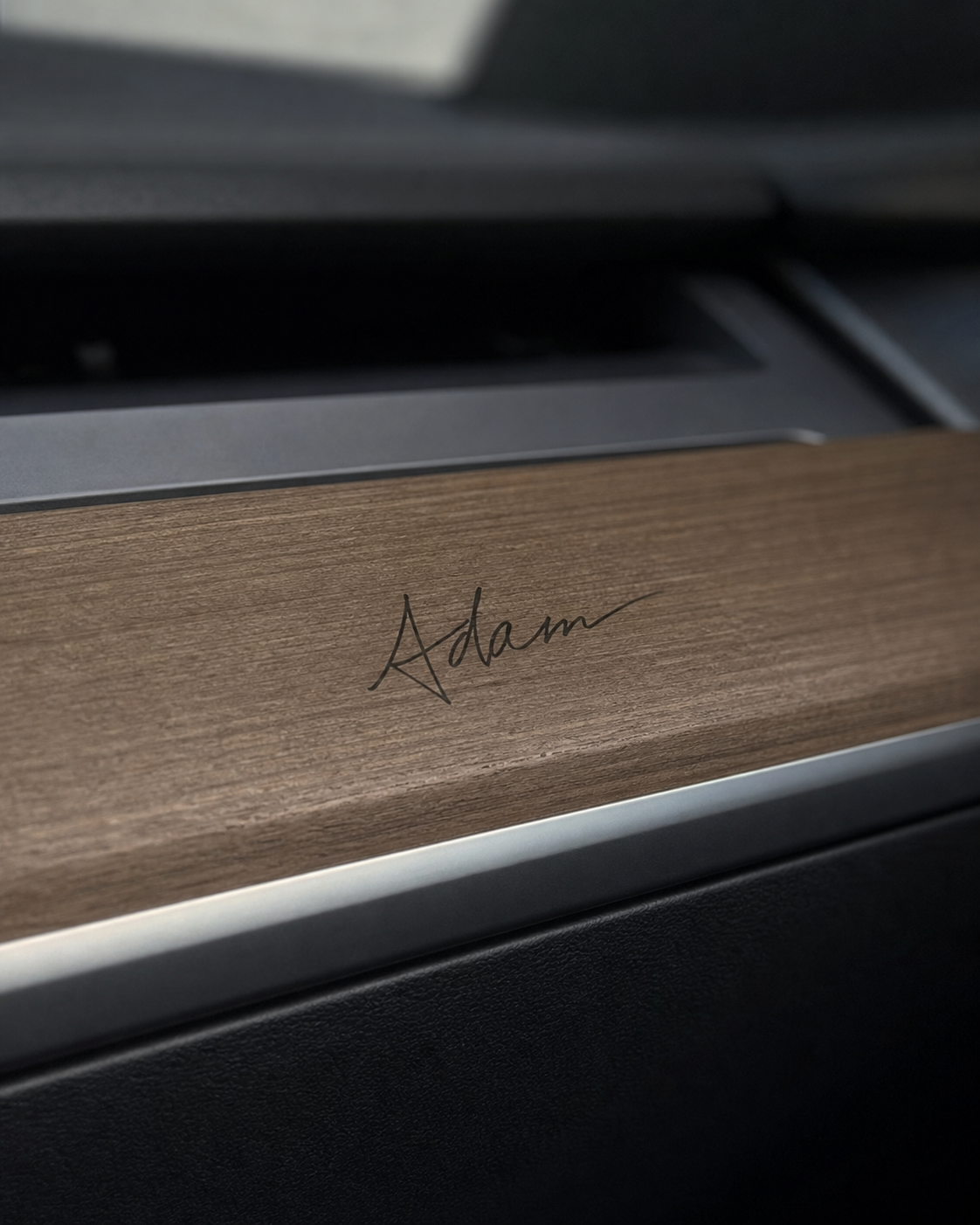 Adam signature applied to wood dashboard trim
