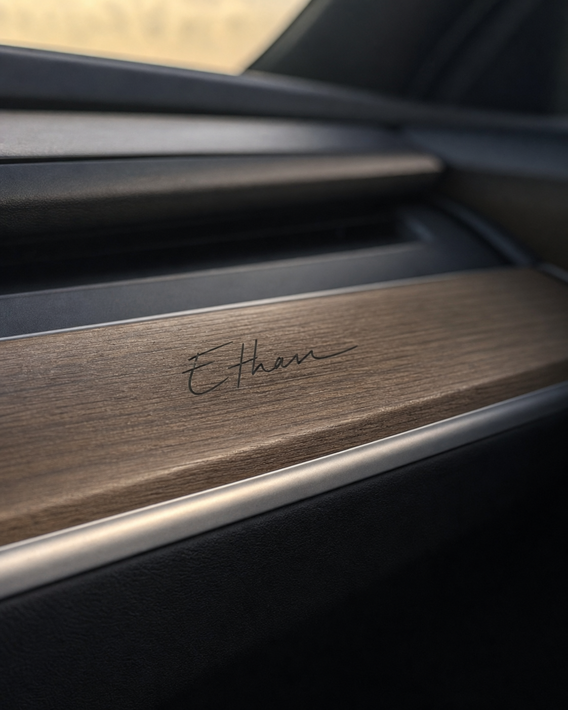 Ethan signature applied to wood dashboard trim