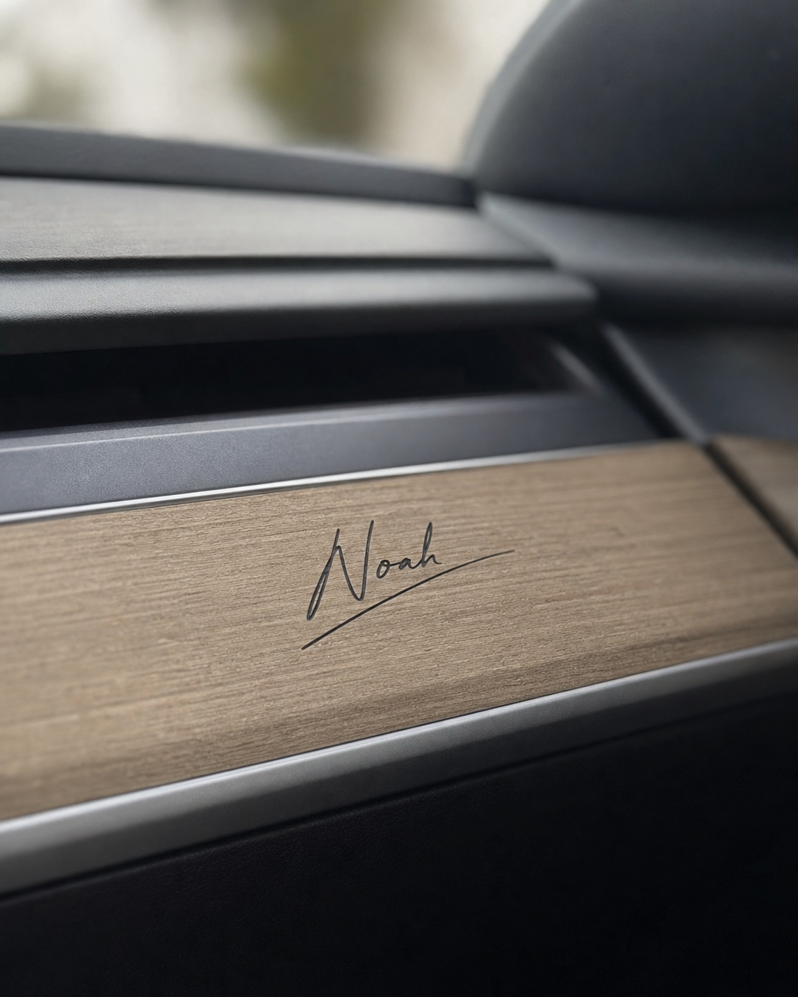 Noah signature applied to wood dashboard trim